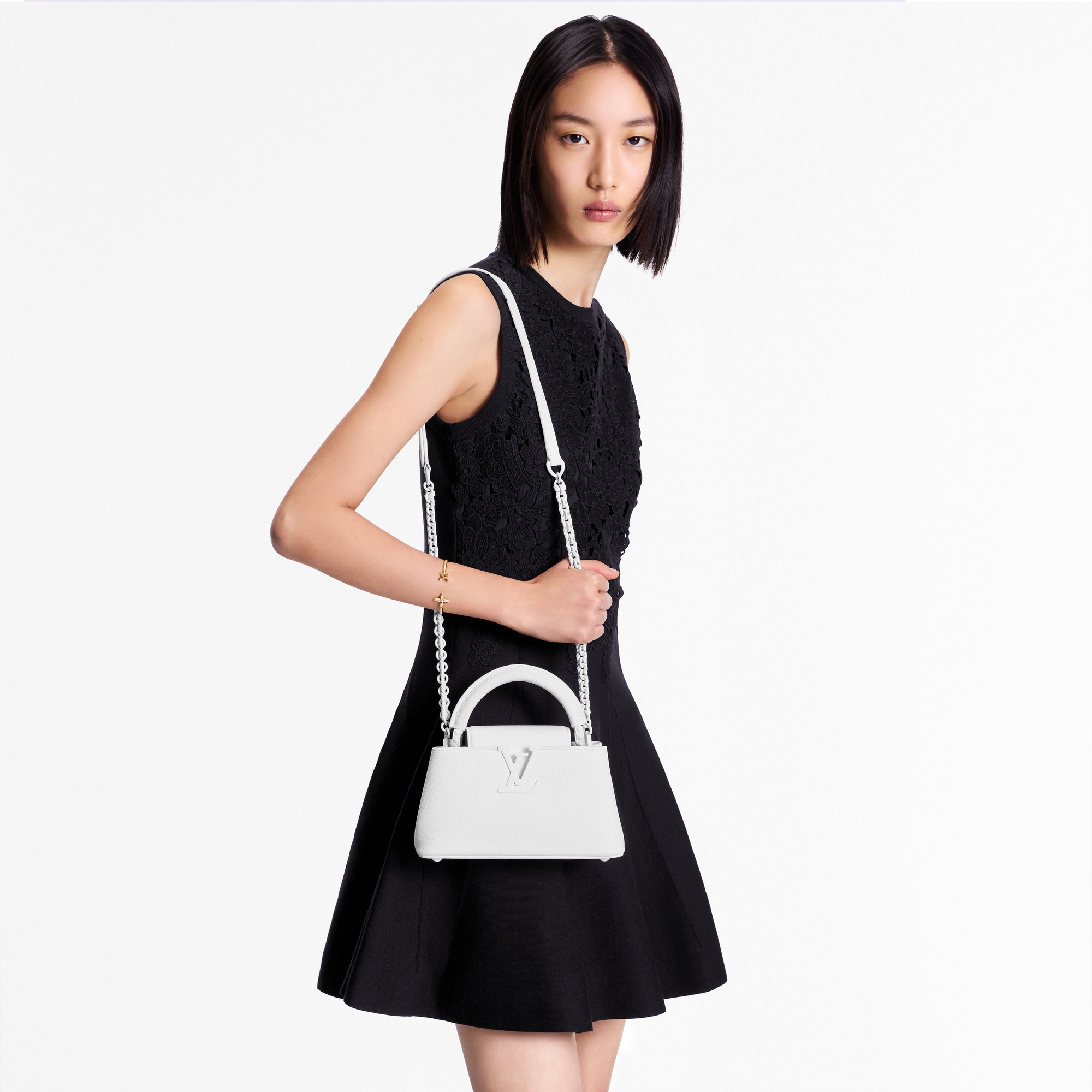 Capucines 핸드백 카퓌신 카퓌신 이스트 웨스트 미니 | 루이비통 공식 온라인 스토어® (크게 보기)