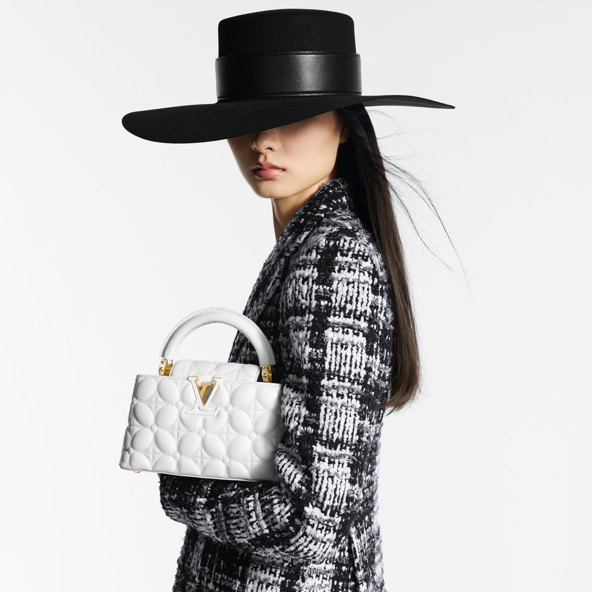 Capucines 핸드백 카퓌신 카퓌신 이스트 웨스트 미니 | 루이비통 공식 온라인 스토어® (크게 보기)