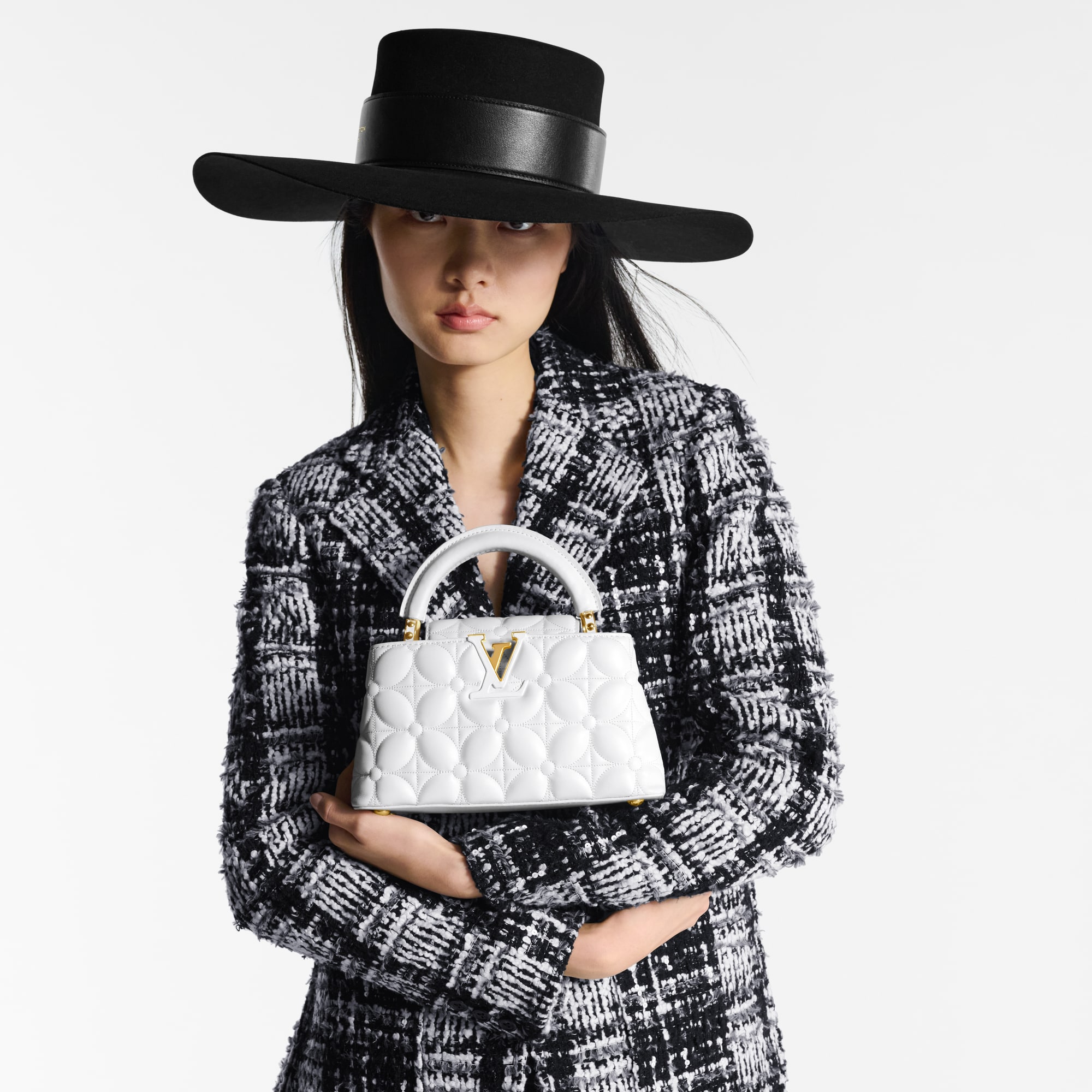 Capucines 핸드백 카퓌신 카퓌신 이스트 웨스트 미니 | 루이비통 공식 온라인 스토어® (크게 보기)