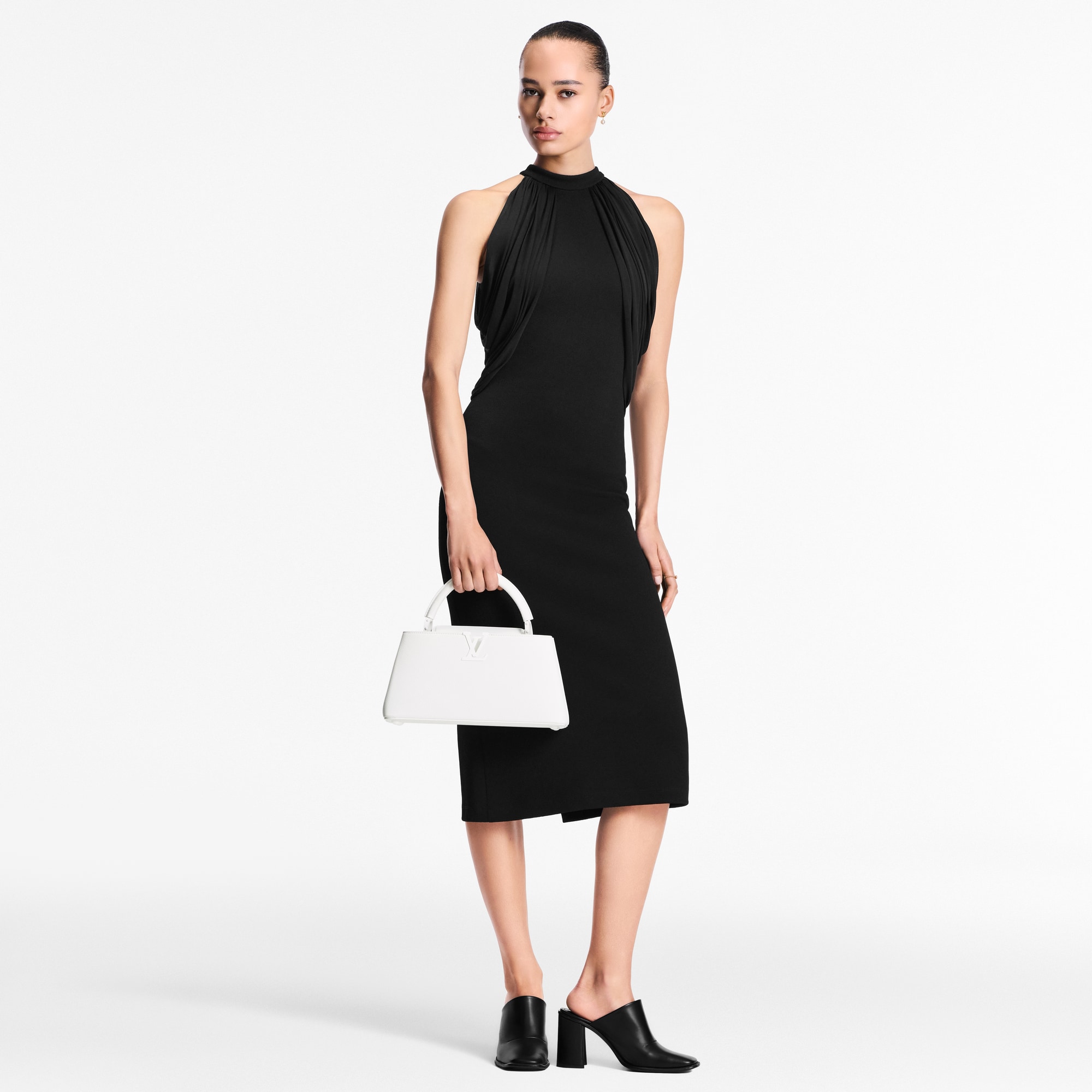 Capucines 핸드백 카퓌신 카퓌신 이스트 웨스트 MM | 루이비통 공식 온라인 스토어® (크게 보기)