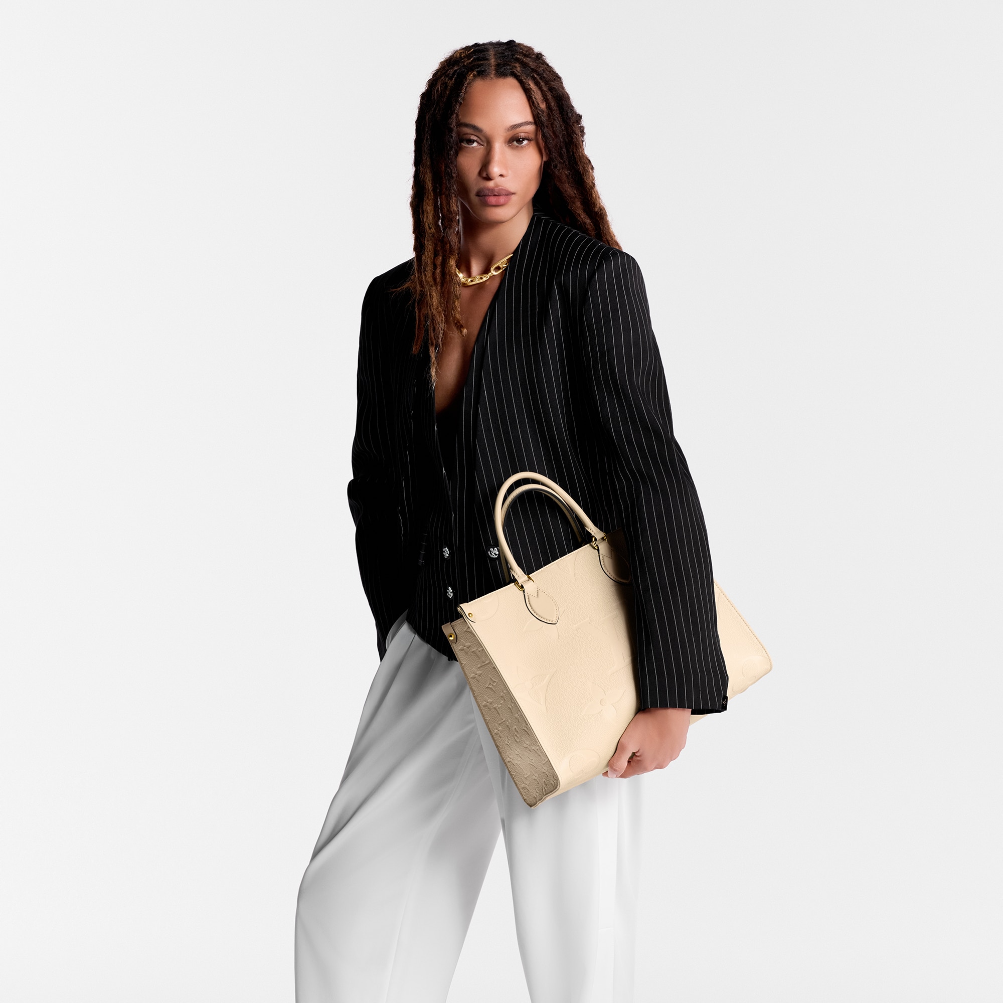 모노그램 앙프렝뜨 핸드백 All Collections 온더고 MM | 루이비통 공식 온라인 스토어® (크게 보기)